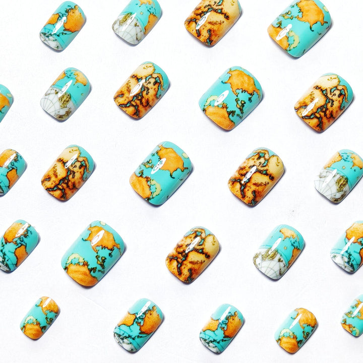 Creative artificial nails with world map inspired design Stornfield