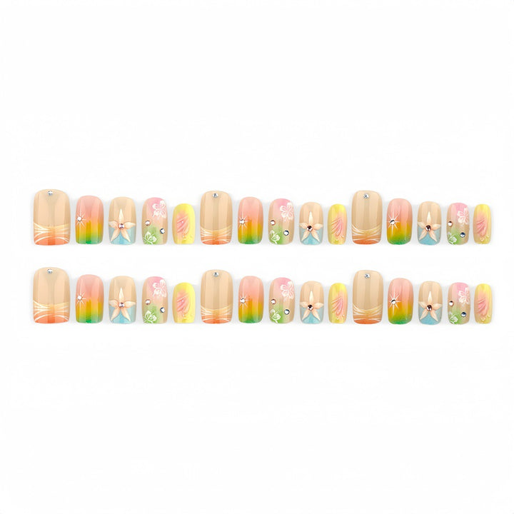Acrylic nails with floral accents and gradient Stornfield