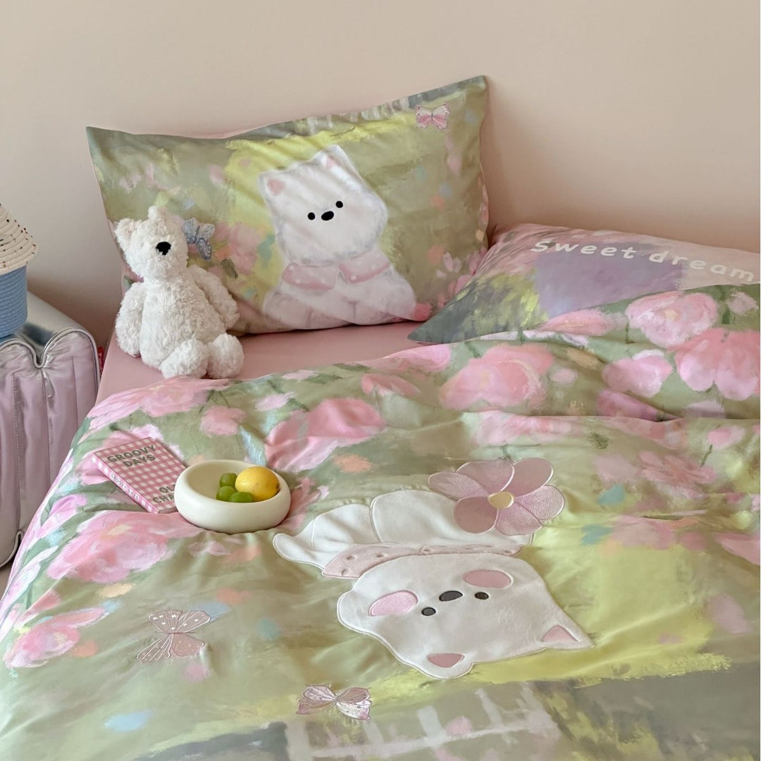 Children's bedding set with applied cat detail, watercolor flower print, and extra soft cotton blend