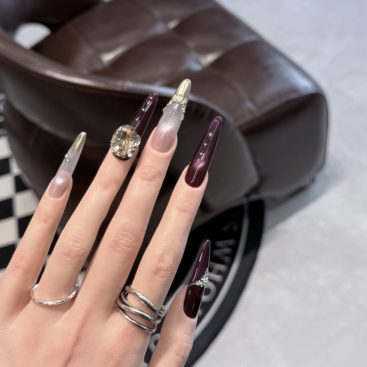 Elegant Stiletto Press-On Nail Set with Decorative Jewel Accents Stornfield