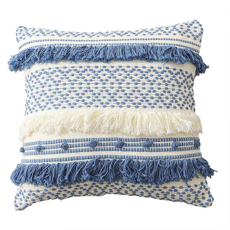 Textured Boho decorative pillow with fringes, tassels, and woven dot pattern