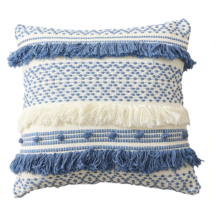 Textured Boho decorative pillow with fringes, tassels, and woven dot pattern