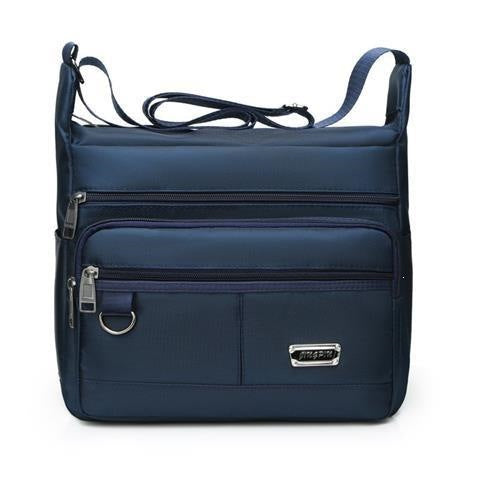 Shoulder bag with multifunctional compartments and adjustable shoulder strap Stornfield
