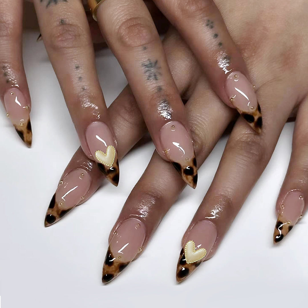 Artistic stiletto nails with trendy animal print Stornfield