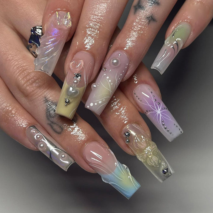 Creative artificial nails with 3D flower embellishments Stornfield