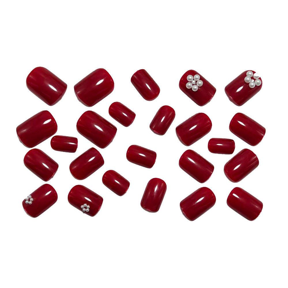 Elegant artificial nails with shimmering rhinestone embellishments Stornfield