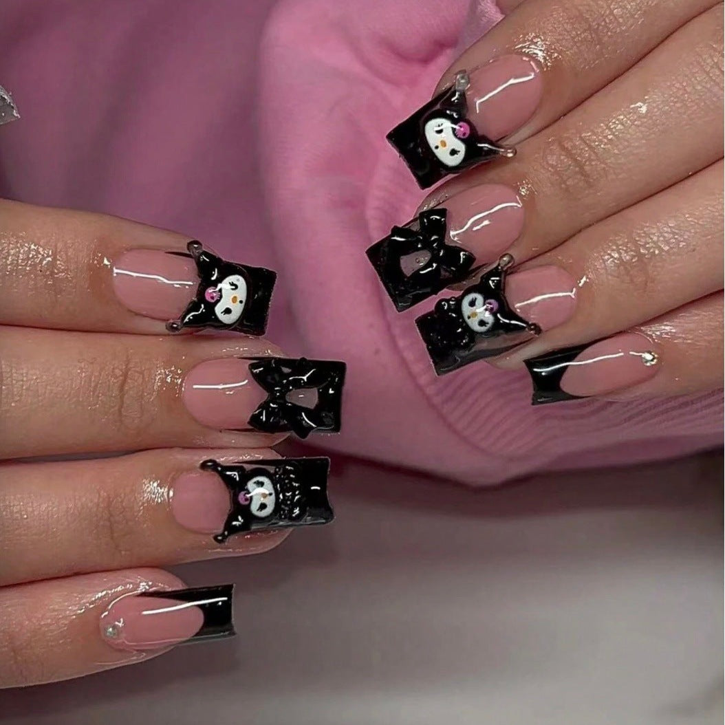 Artificial nail set with festive winter motifs and playful shiny accents Stornfield