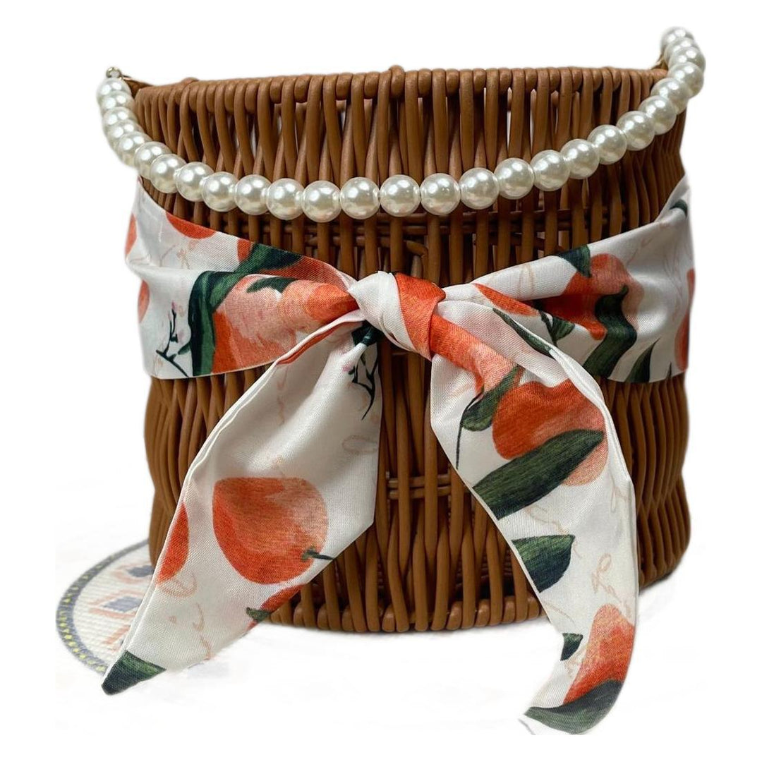 Women's stylish rattan container with pearl handle Stornfield