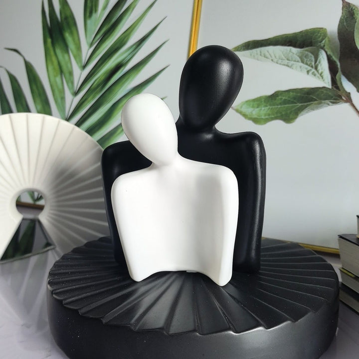 Artistic Dual Figure Decoration Stornfeild