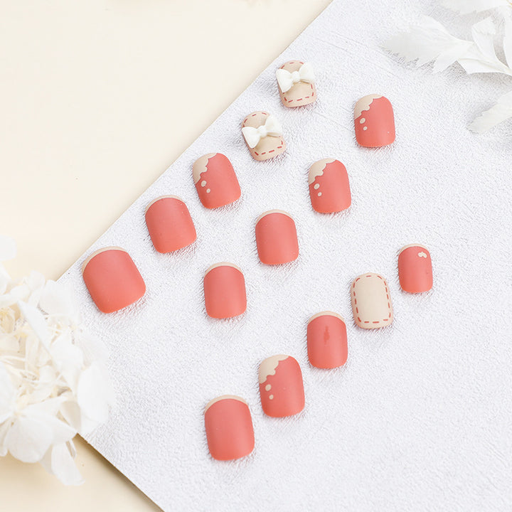 Artistic nail nails with decorative bow designs and French tips Stornfield