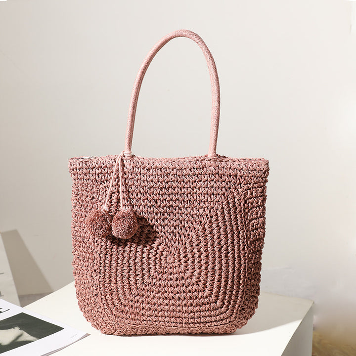 Handmade straw bag with pompom details Stornfield