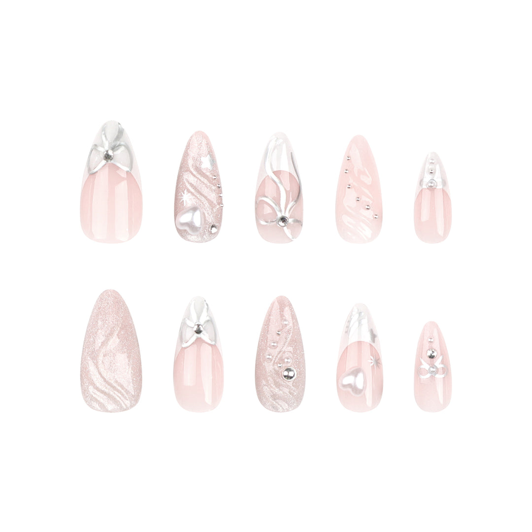 Artful stiletto nails with elegant decoration Stornfield