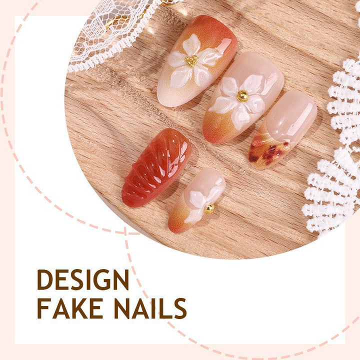 Artificial nail set with handcrafted flowers and elegant embellishments Stornfield