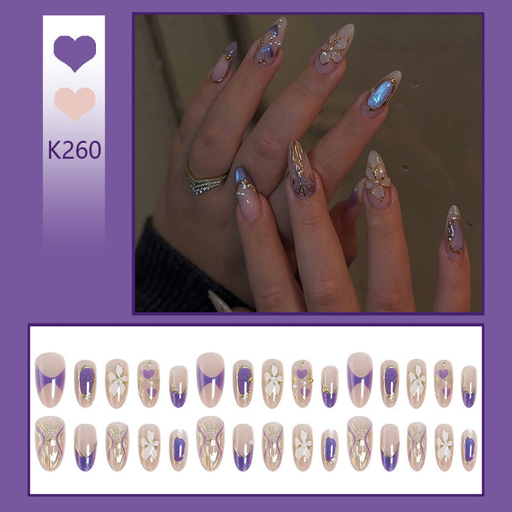 Artificial nail set with elegant flower and glitter details Stornfield
