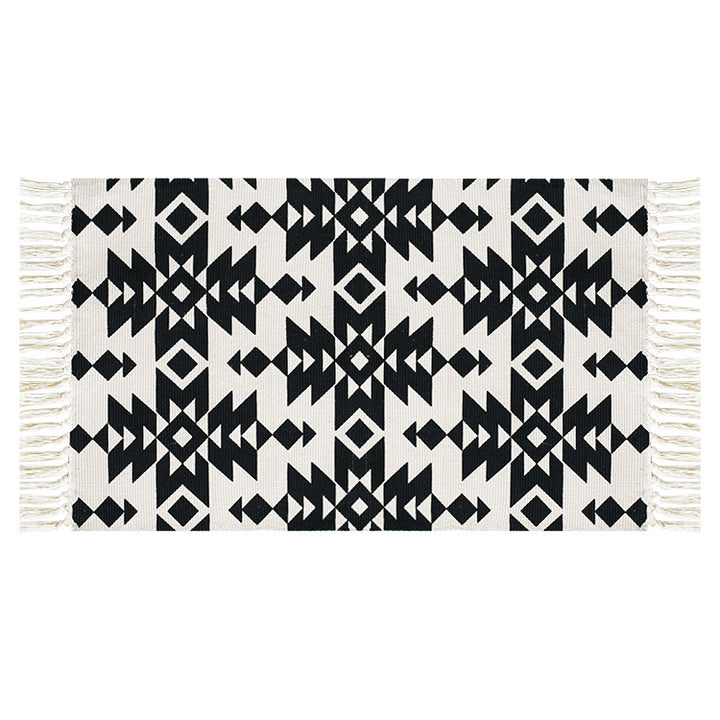 Flat-woven cotton runner with Mediterranean tile jacquard and decorative fringes Stornfield