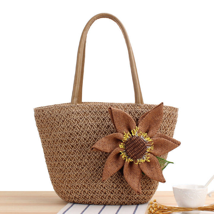 Handbag with floral appliqué Made of natural material Stornfield