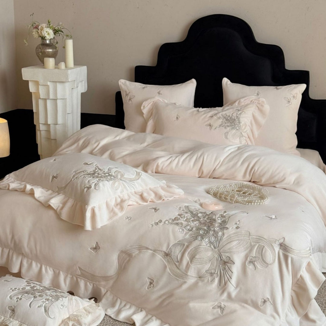 Luxurious bedding set with ruffles and floral embroidery