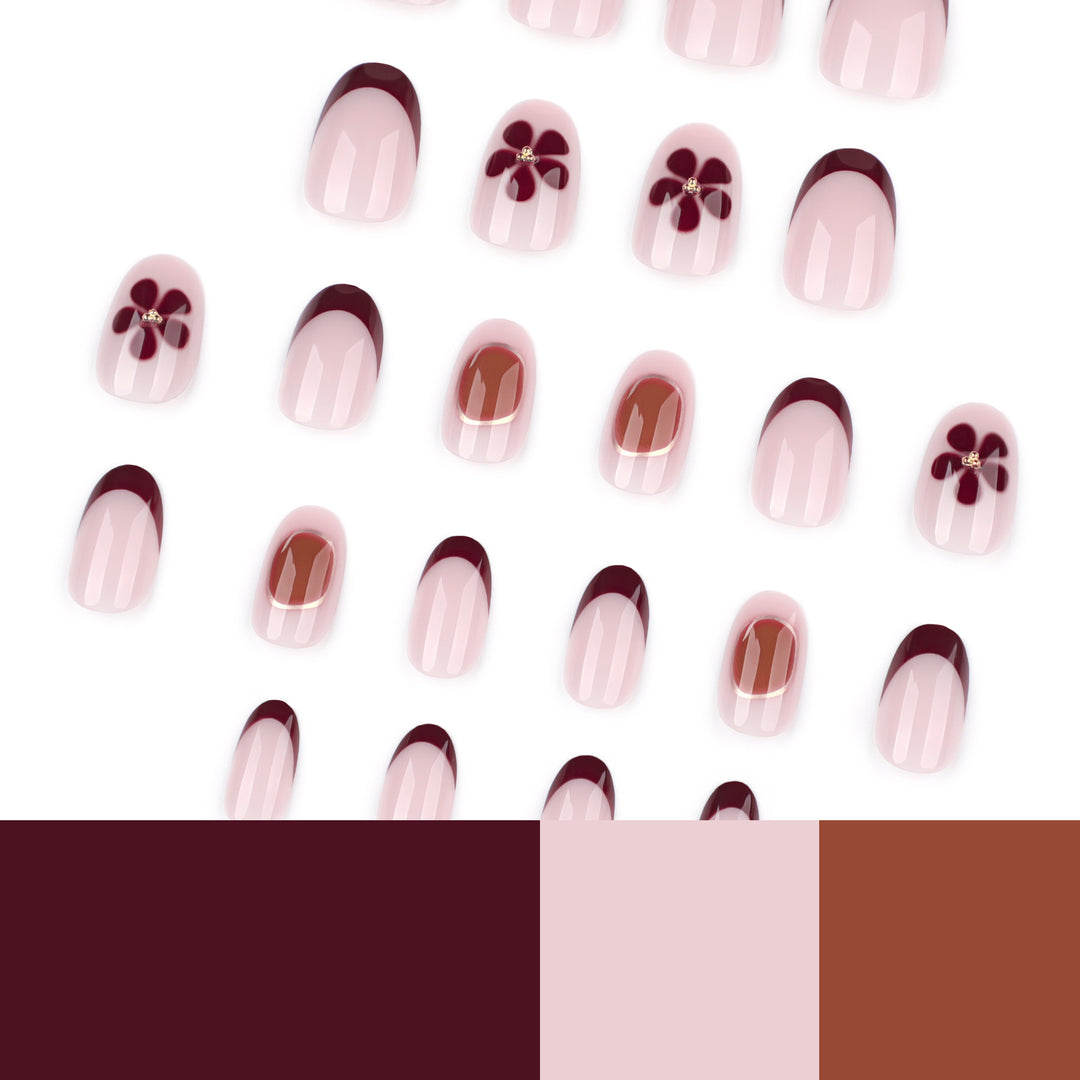 Elegant Nail Art with Floral Accents and Golden Details Stornfield