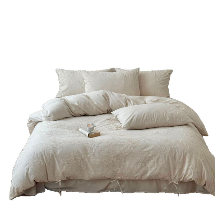 Luxurious cotton bedding set with embroidered paisley design and ties