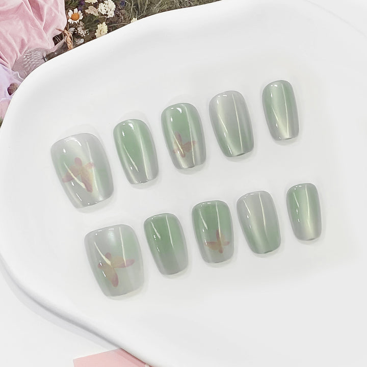 Artful artificial nails with shimmering design Stornfield