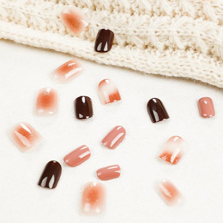Elegant Nail Art with Glitter and Ombre Effect Stornfield