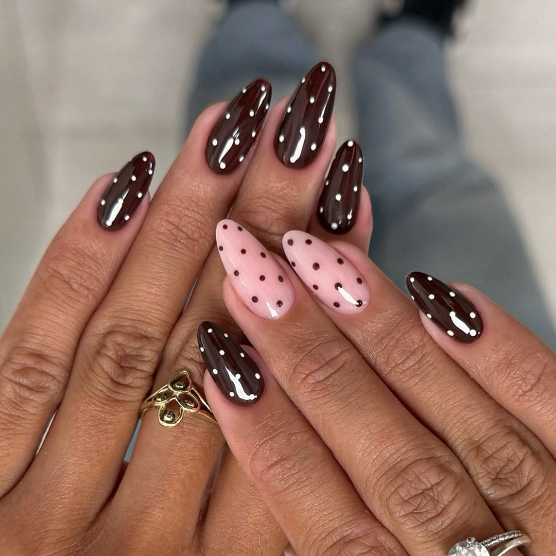 Artificial nails with creative dot pattern and elegant accents Stornfield