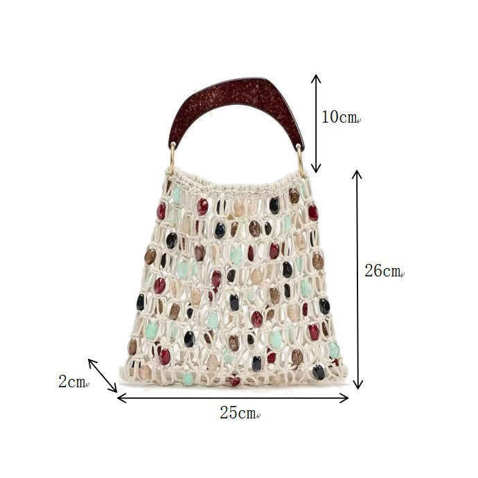 Handcrafted designer shoulder bag with unique stone accents Stornfield