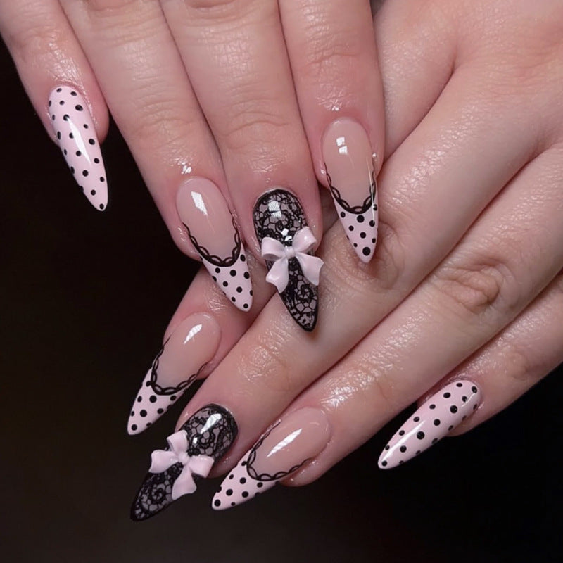 Elegant and artistic stiletto nails with tips and bows Stornfield