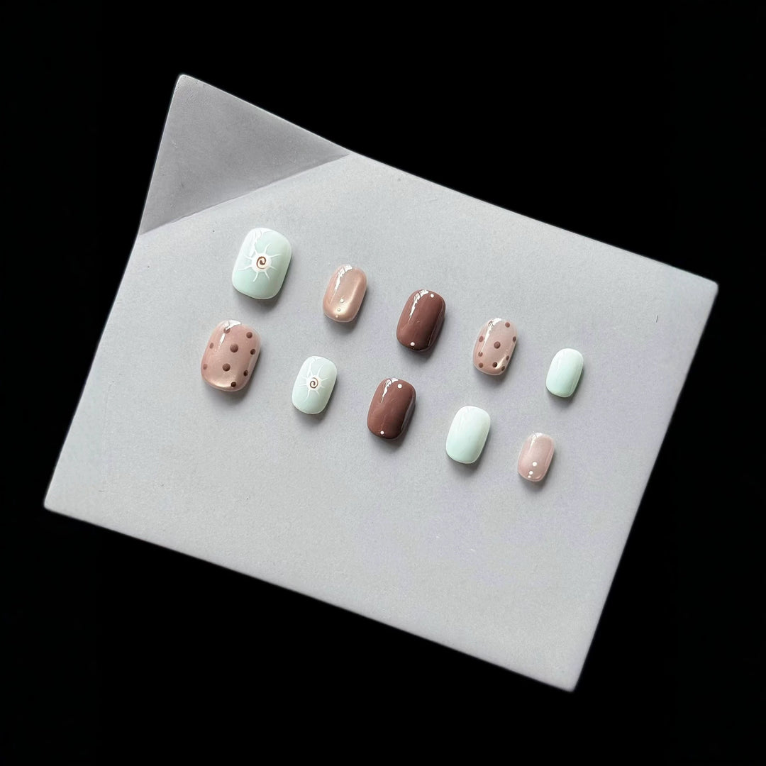 Decorative Press-On Nail Set with Unique Artistic Designs