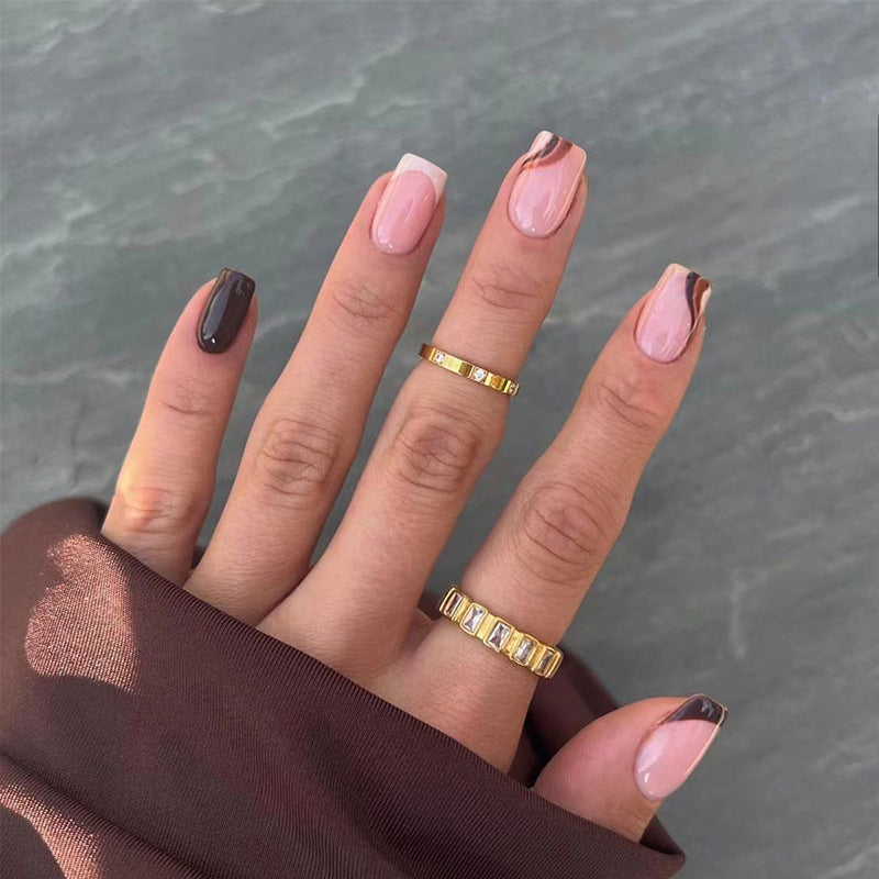 Artful nail extensions with an elegant leaf pattern Stornfield