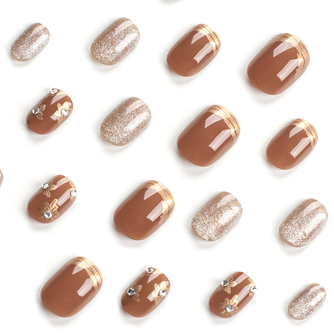 Elegant Nail Decoration with Glitter and Floral Accents Stornfield