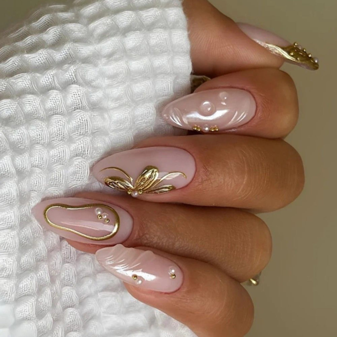 Elegant artificial nails with flower and glitter accents Stornfield