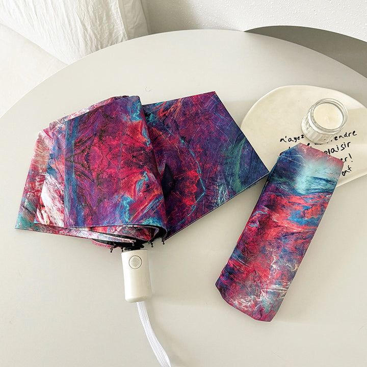 Ladies elegant folding umbrella with unique marble pattern Stornfield