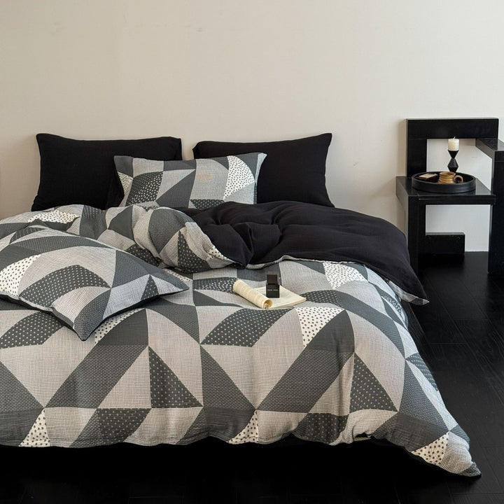 Patchwork bedding set with animal and check pattern design