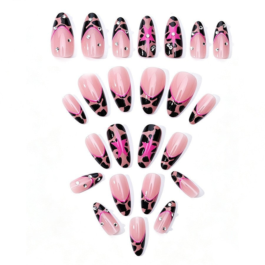 Nail set with glamorous leopard design and glitter elements Stornfield