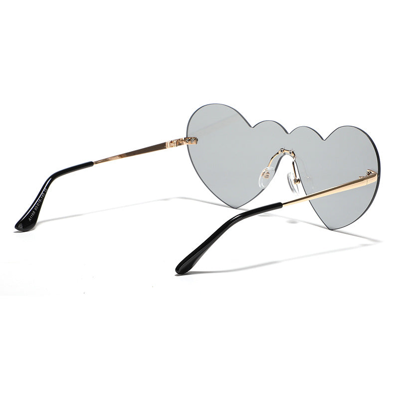 Ladies extravagant heart sunglasses with protective lenses Stornfield