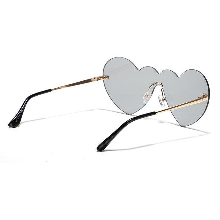 Ladies extravagant heart sunglasses with protective lenses Stornfield