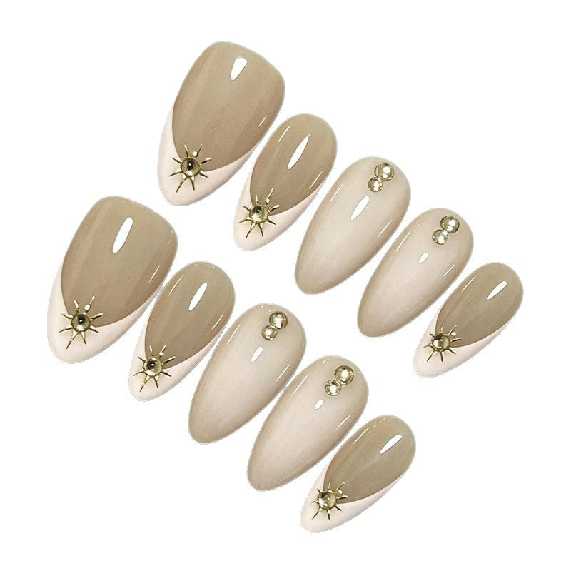 Nail set with elegant design elements and glamorous accents Stornfield