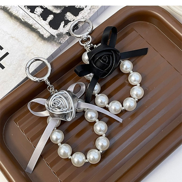 Elegant Pearl and Leather Charm Keychain Stornfield
