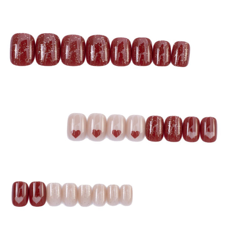 Artificial nails in romantic heart design Stornfield