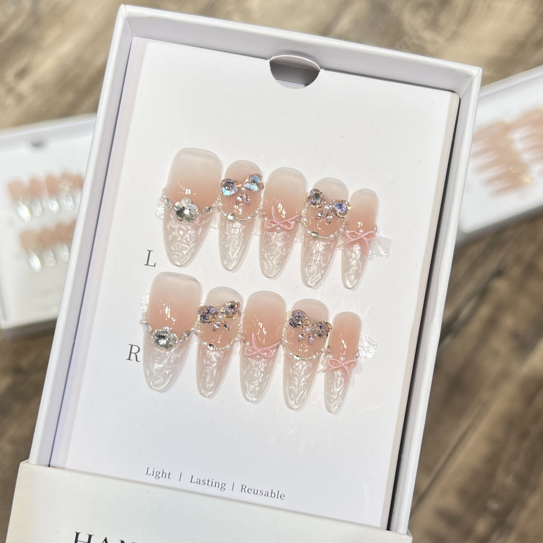Decorative Stiletto Press-On Nail Set with Bow and Gem Accents Stornfield