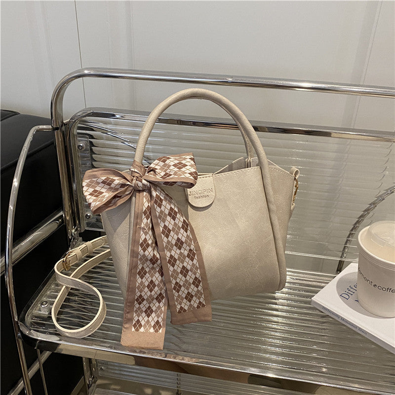 Elegant Bow Accent Handbag Stornfield