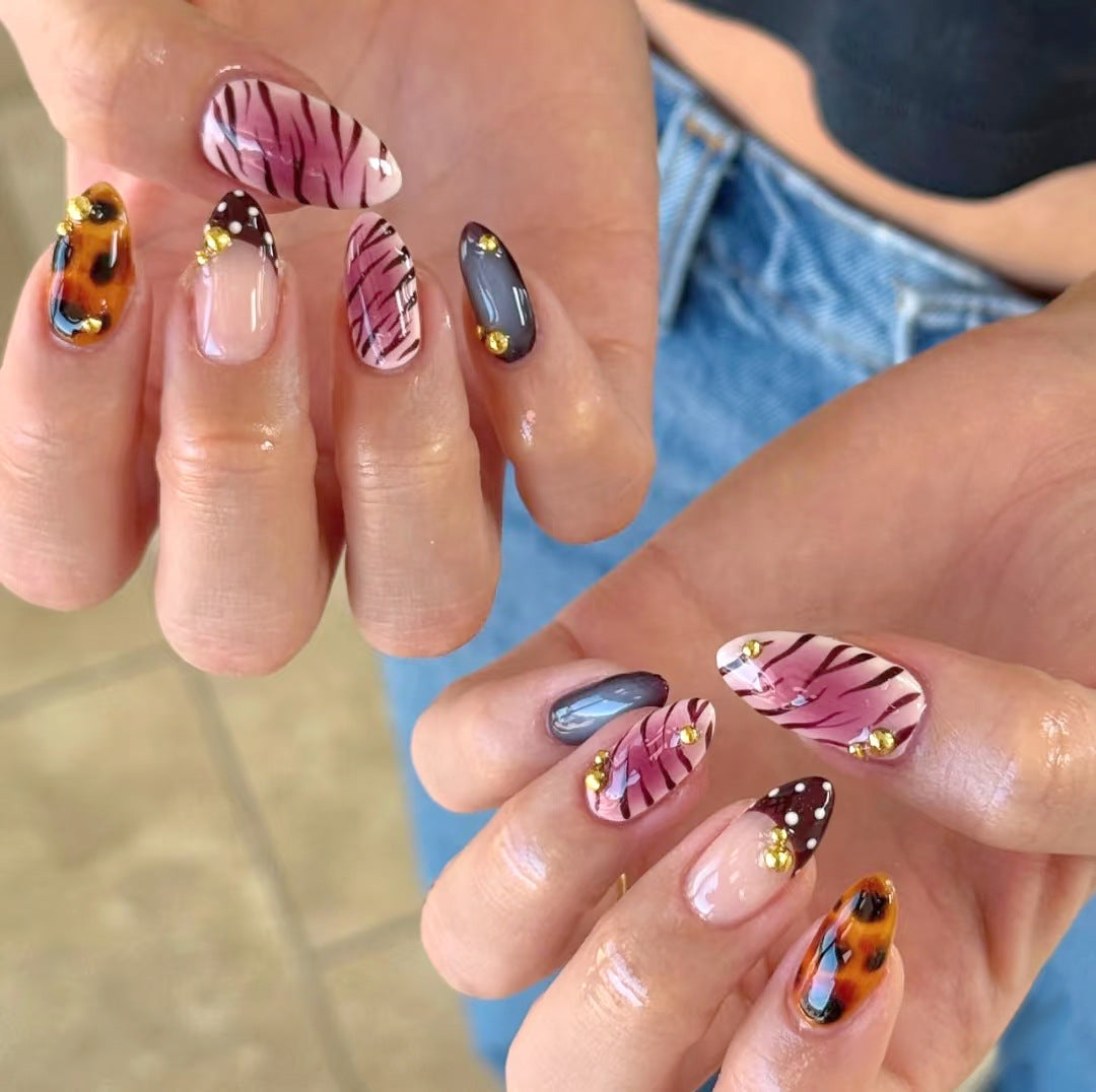 Artistic Press-On Nail Set with Unique Patterns and Embellishments Stornfield