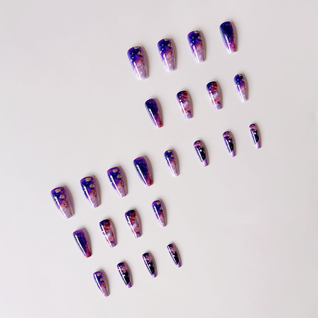 Glittering artificial nail tips in galaxy design Stornfield