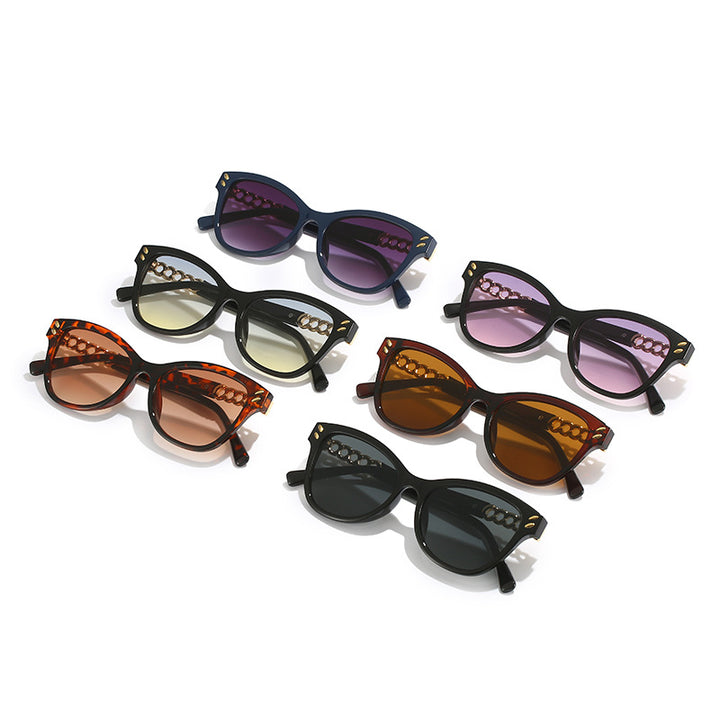 Ladies fashionable cat-eye sunglasses with luxurious chain accents Stornfield