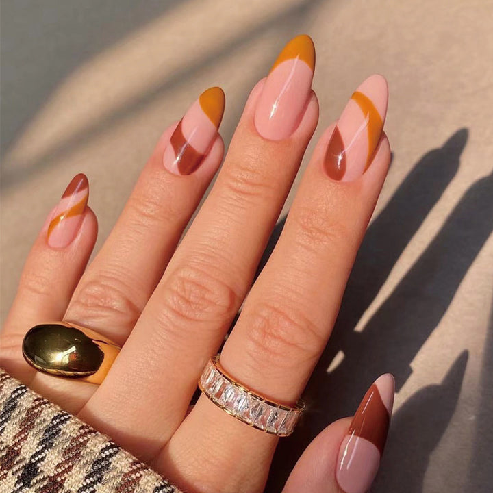 Artful nail extensions with an elegant leaf pattern Stornfield