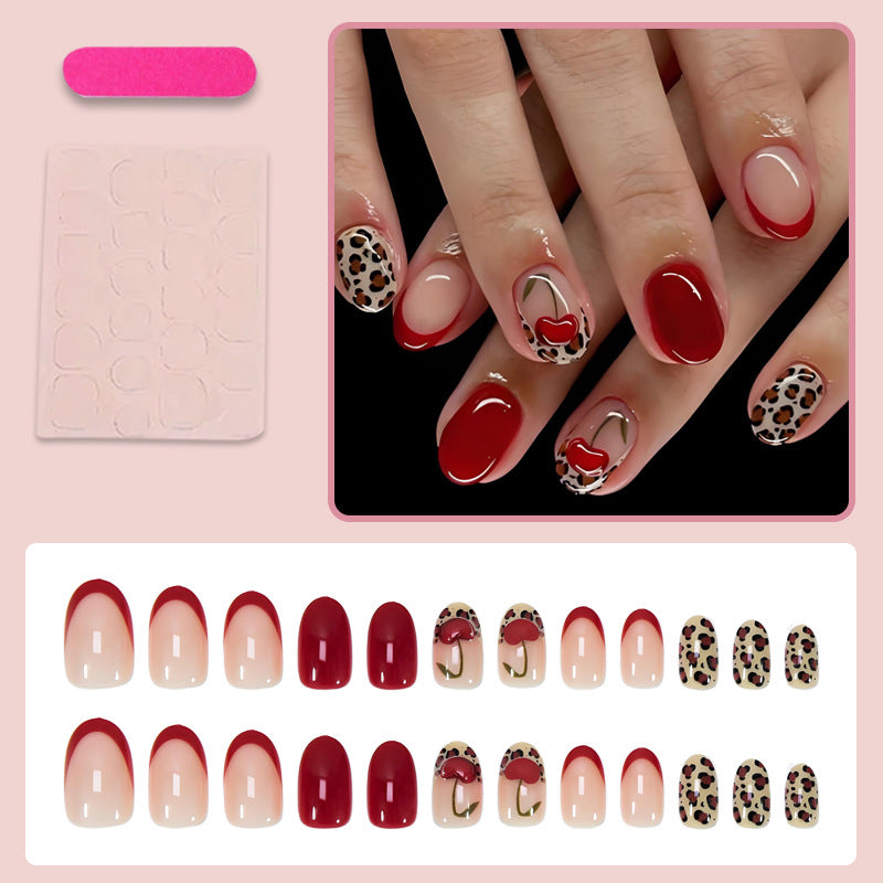 Artificial nail set with trendy leopard and cherry designs Stornfield