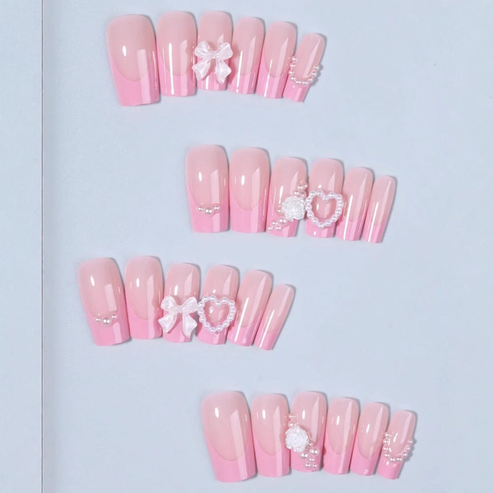 Artificial nail set with romantic heart and flower decorations Stornfield