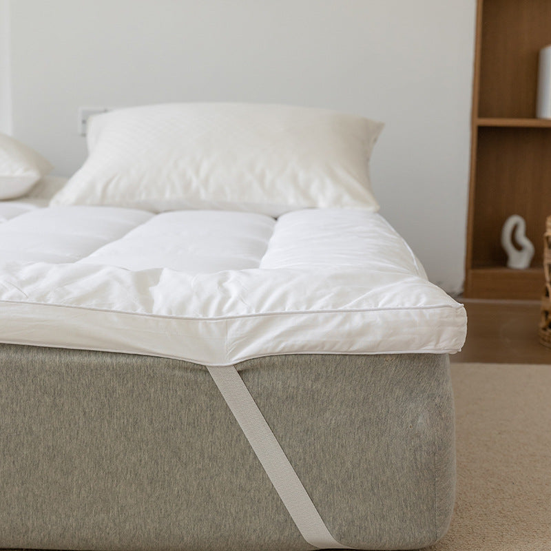 Padded mattress topper with a light down look and breathable hollow fiber filling