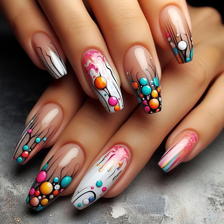 Creative artificial nails with intricate gradient and dot design Stornfield